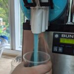 Blue Slushie being poured into a cup